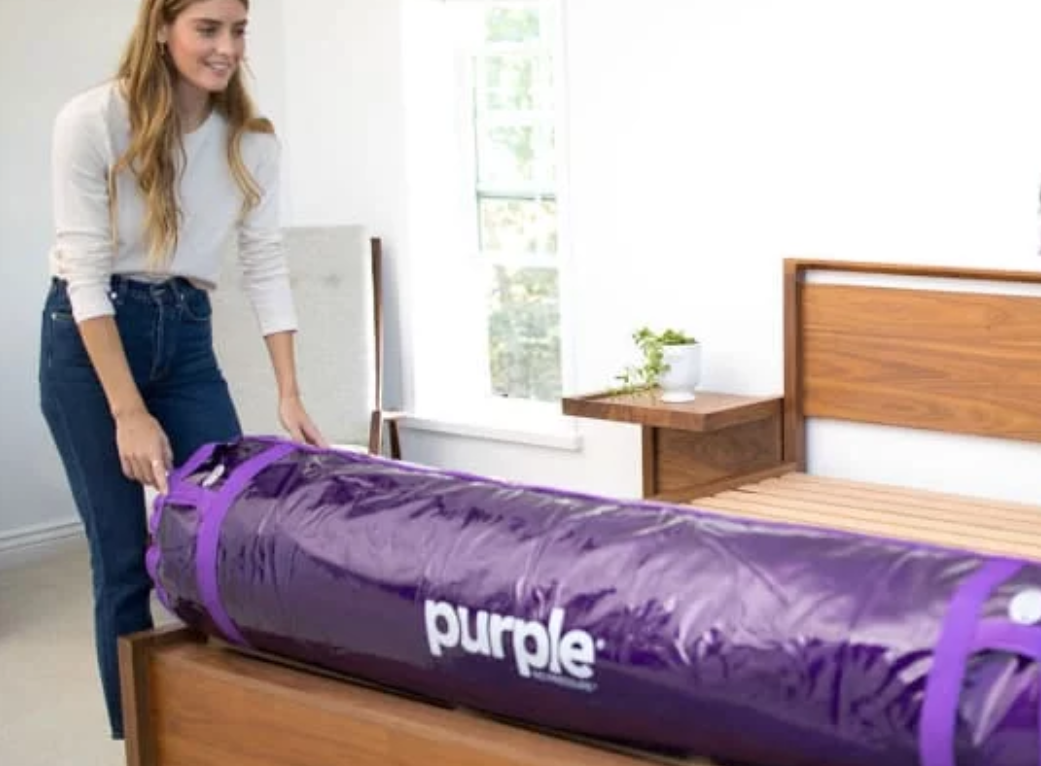 purple mattress in a bag